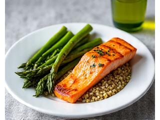 Healthy plate of food with fresh vegetables, lean protein and whole grains.